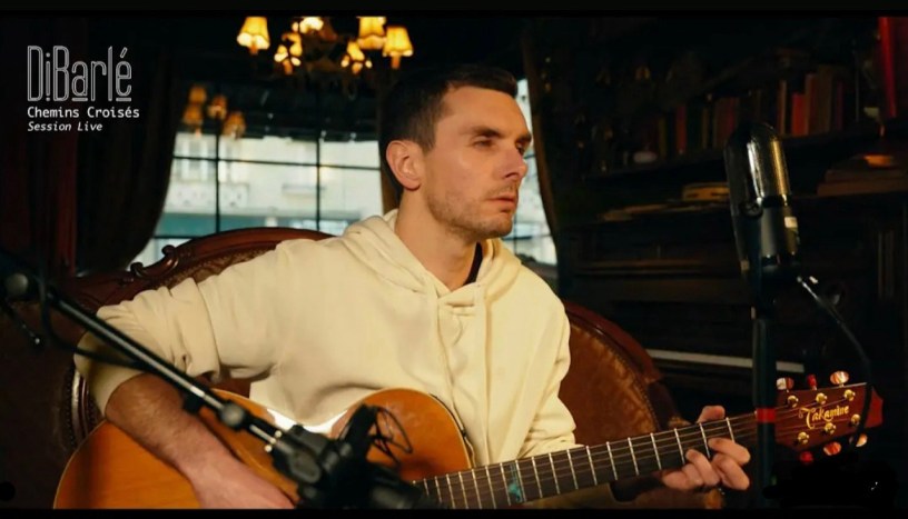 Capture d’écran YouTube de la session live du single "Chemins Croisés" de DiBarlé.